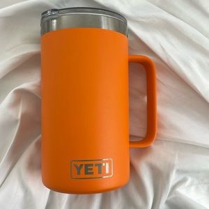 Yeti 24oz rambler mug with a handle limited edition king crab orange. Mag slider